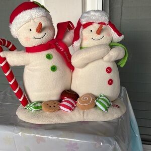 Cheerful Snowman Duo Holiday Decor. Needs 4 double A batteries not included.